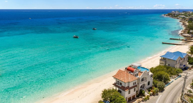 Luxury Villa Beach Front Caribbean Sea views, 5 bedrooms in Seven Mile Beach for sale For Super Rich
