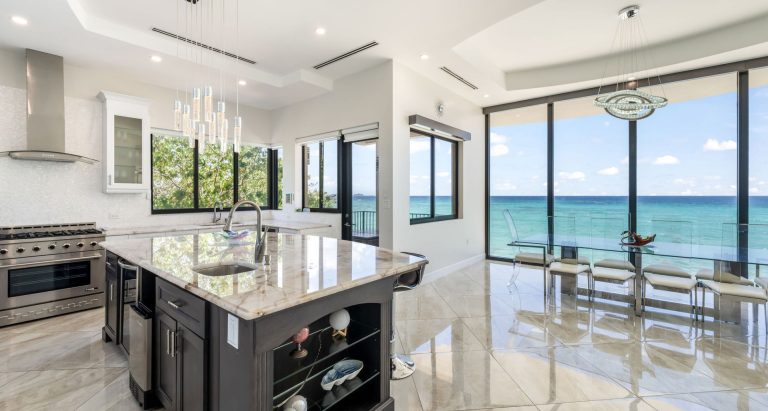 Luxury Villa Beach Front Caribbean Sea views, 5 bedrooms in Seven Mile Beach property for sale For Super Rich